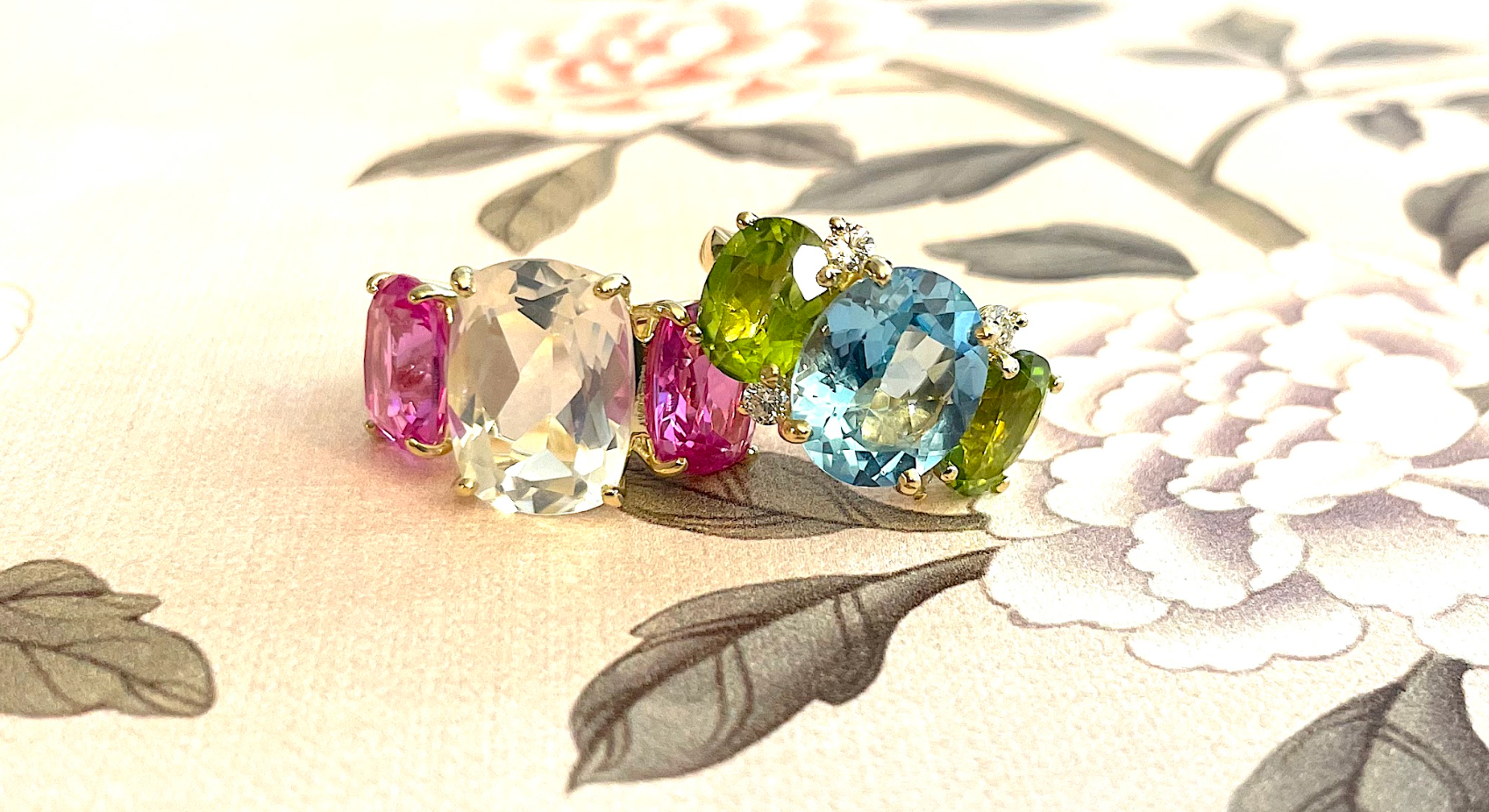 Elegant Three-Stone Ring with Gold Rope Twist Border
