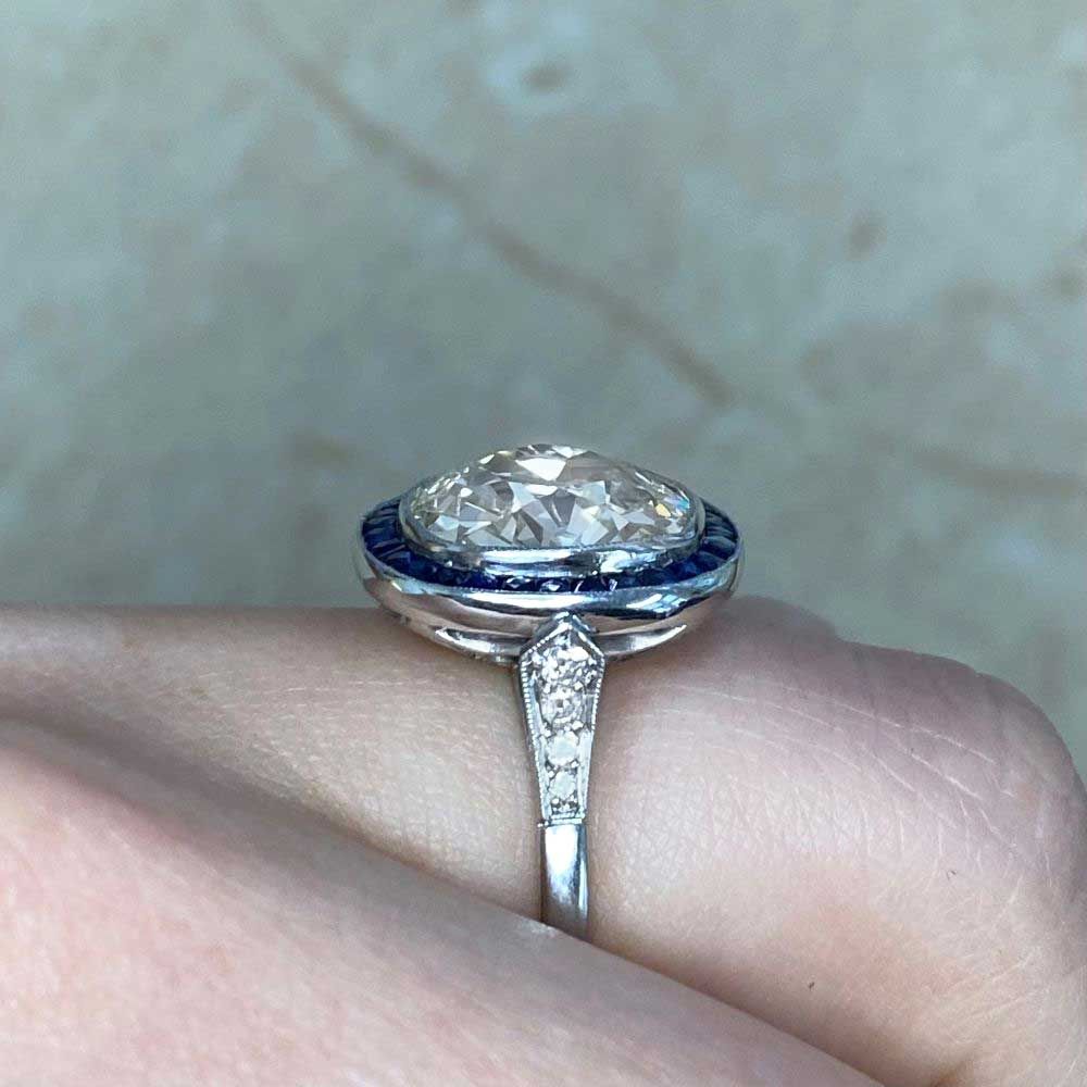 Platinum European cut Diamond and Emerald Ring