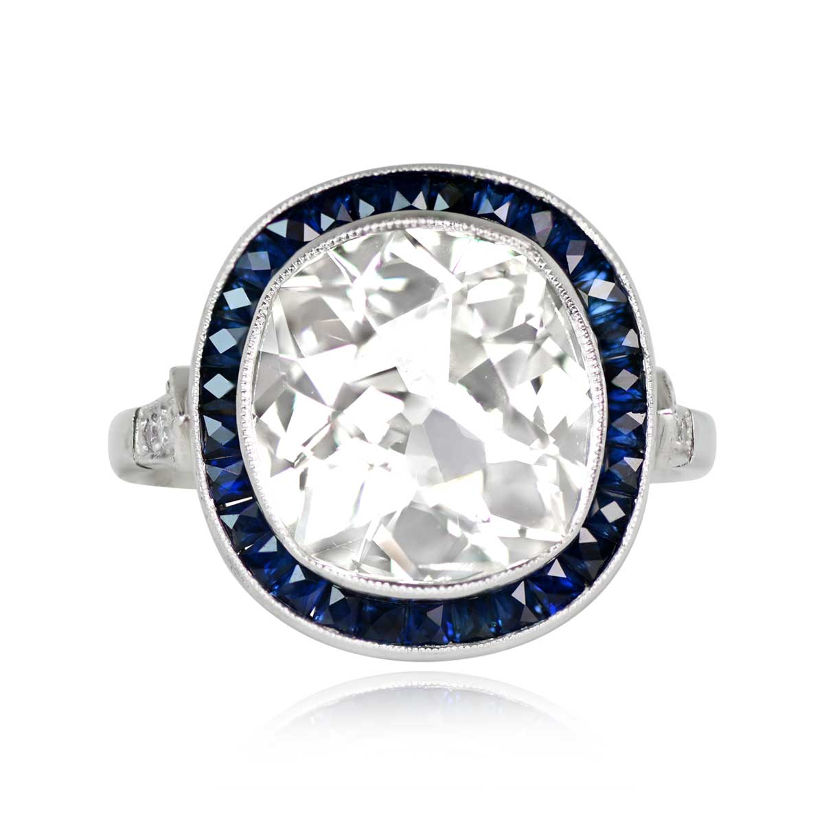 Platinum Cushion Cut Diamond and Sapphire Halo set Ring