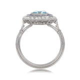 Platinum European cut Diamond and Emerald Halo set Ring