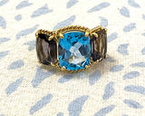 18kt Yellow Gold Blue Topaz and Rock Crystal Three Stone Ring with Rope Twist Border