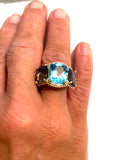 18kt Yellow Gold Blue Topaz and Rock Crystal Three Stone Ring with Rope Twist Border