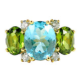 Elegant Three-Stone Ring with Gold Rope Twist Border with Blue Topaz and Peridot